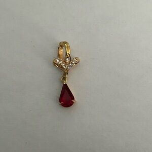 Vintage gold toned signed “Roman” ruby red necklace pendant